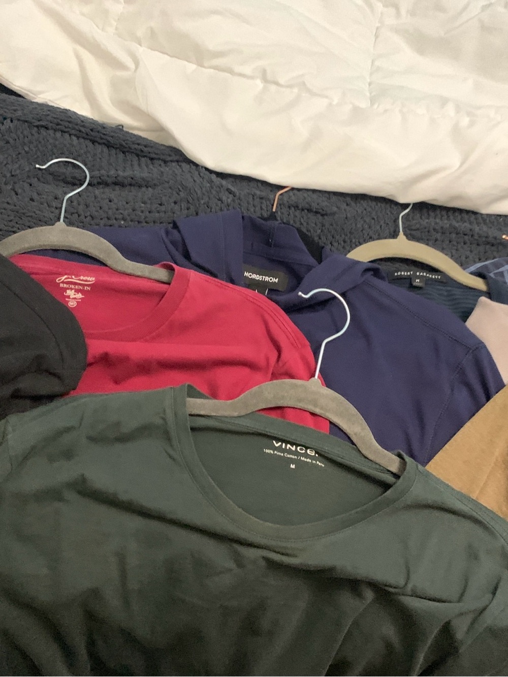 A lot of 12 long sleeves Tees, Thin Hoodies, a button down. $14 each or All $130